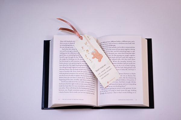 sticky bear bookmarks on book hanging round